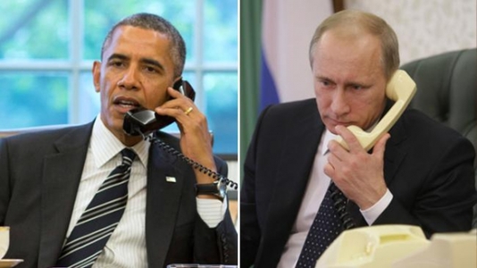 Обама, Путин нар утсаар ярьжээ