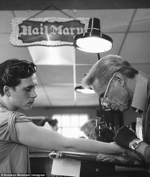 Бекхэмийн хүү шивээс хийлгэв