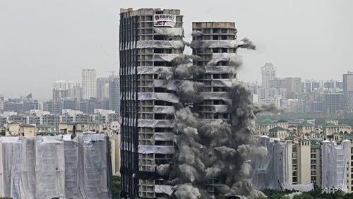 Энэтхэгт зөвшөөрөлгүй барьсан ихэр цамхагийг нураажээ