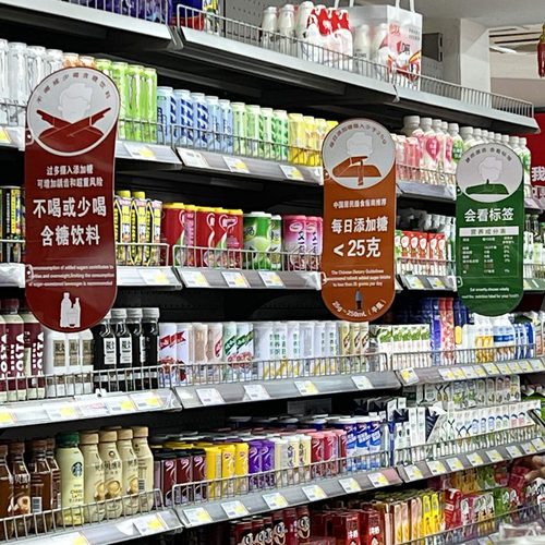 Шанхайн дэлгүүрүүд чихэрлэг ундааны хор уршгийг анхааруулах мэдээллийн самбартай болно